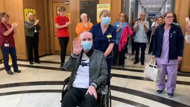 John Burns leaving hospital