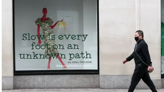 Man walks down street in Republic of Ireland