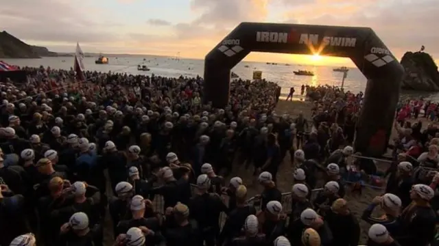 Swimmers at the start of the Ironman race