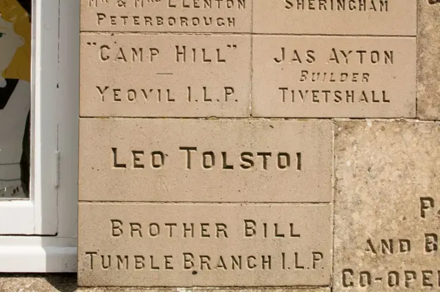 Inscribed stones on the Burston Strike School