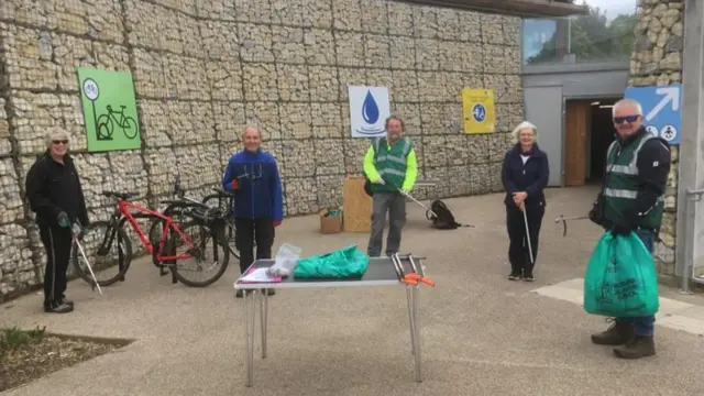 Volunteers clearing up rubbish