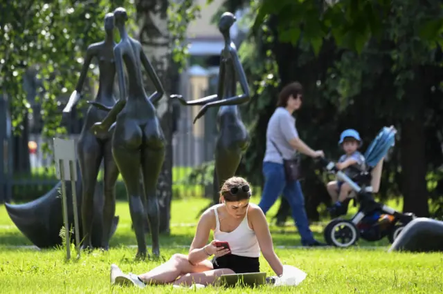 Woman sits in a Moscow park