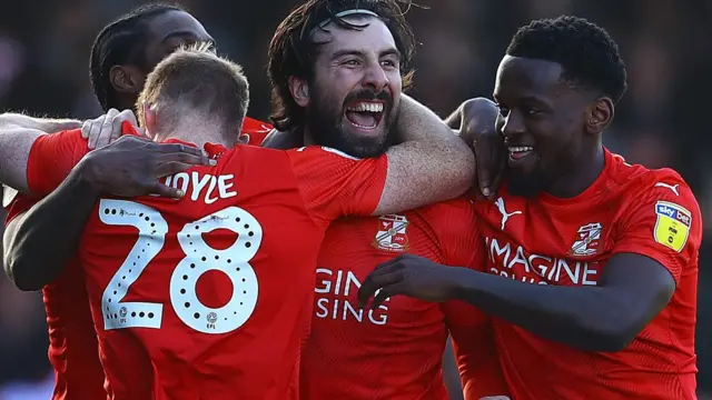 Swindon Town will be promoted as League Two champions