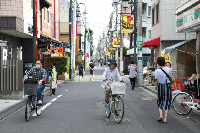 People cycling in Japan