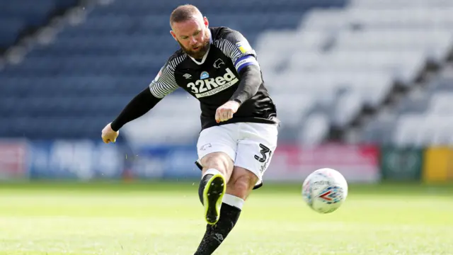 Wayne Rooney scores with a free-kick