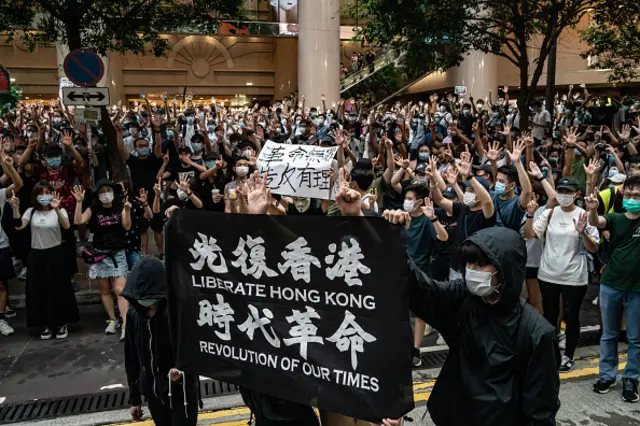 Demonstrators take part in a protest against the new national security law