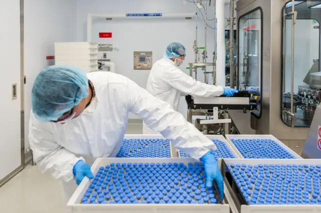 Lab technicians at a Gilead Sciences facility in California