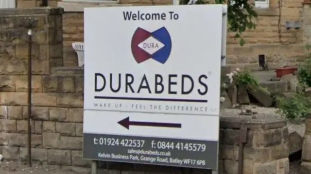 Dura Beds sign