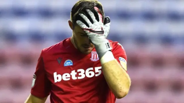 Jack Butland of Stoke City looks dejected during the game