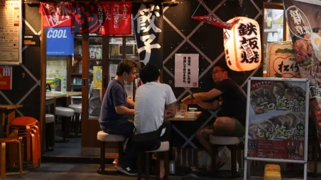 People in bar in Japan