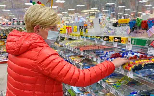 A masked shopper