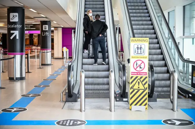 Two passengers at Edinburgh Airport