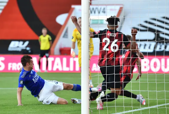 Jamie Vardy of Leicester City scores his team's first goal