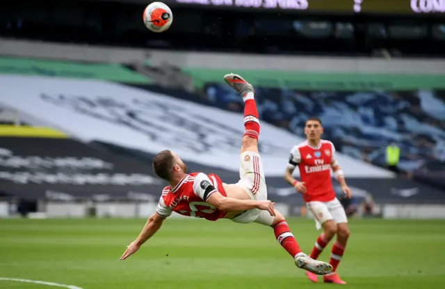 Shkodran Mustafi of Arsenal over head kicks