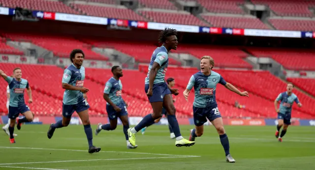 Wycombe celebrate their early goal