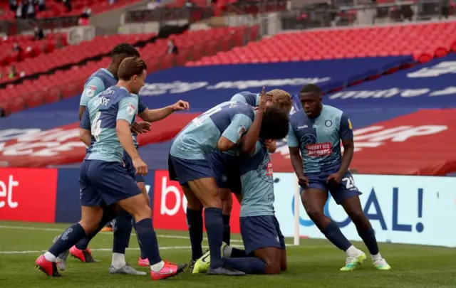 Wycombe celebrate their first-half goal