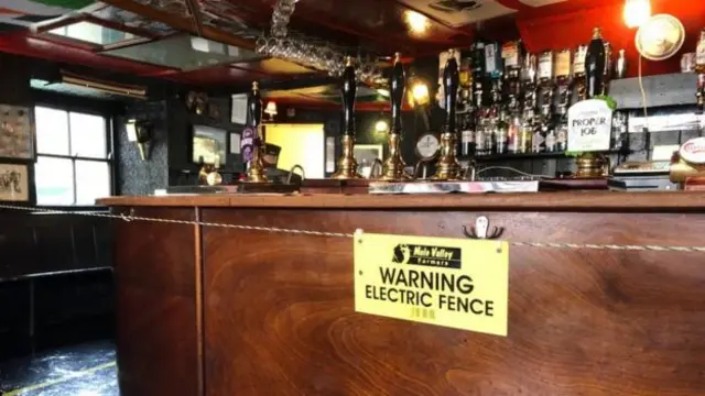 Electric fence around the bar at the Star Inn