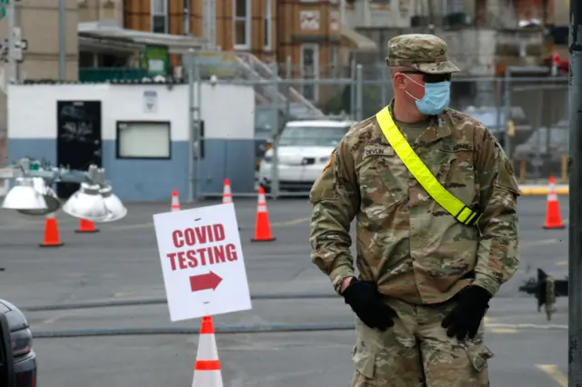 A US soldier guards a testing site in New York in April