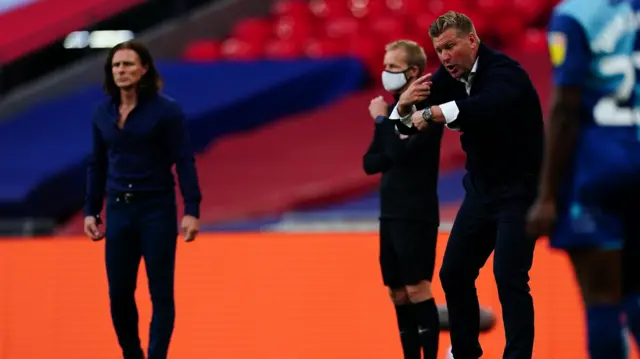 Managers Gareth Ainsworth and Karl Robinson