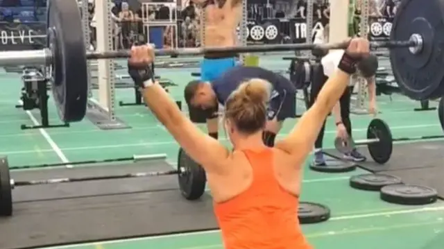 Molly Williams lifting weights