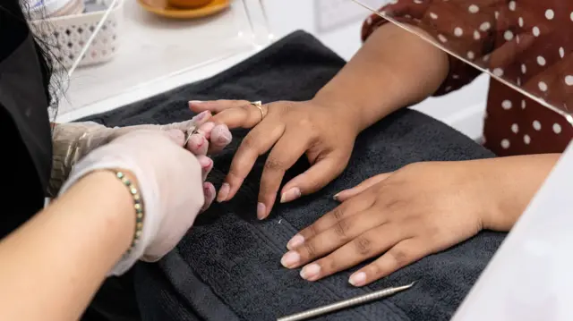 Nails being done