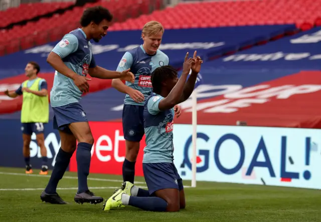 Wycombe celebrate their early goal