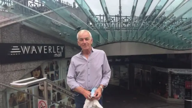 A shopper outside Waverley Mall