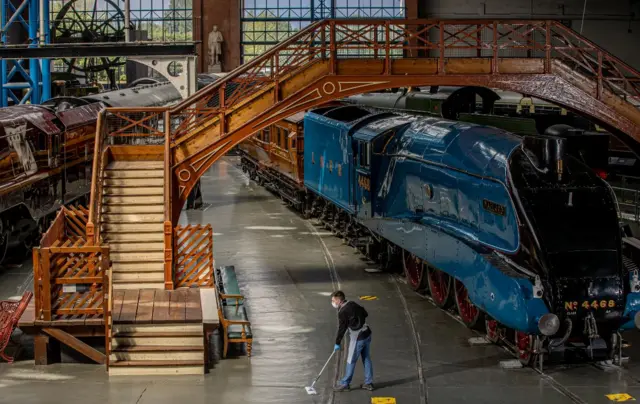 Mallard and worker at national Railway museum