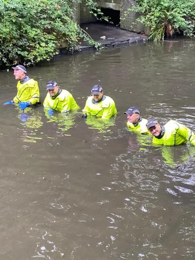 Police searching the water in Solihull for evidence in the Kerry Woolley murder probe