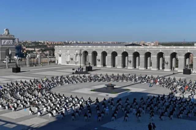 AAround 400 people gathered at a distance at the Royal Palace in Madrid