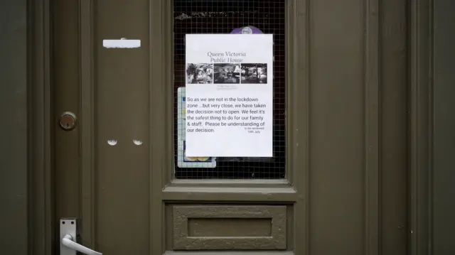 Sign on pub door in Leicester