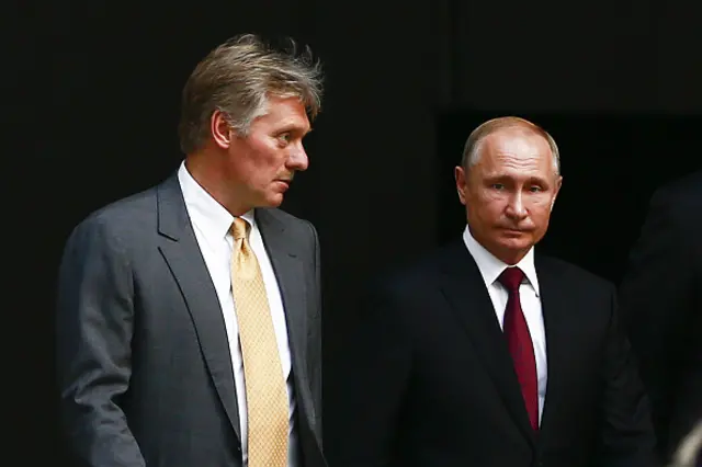 Kremlin spokesman Dmitry Peskov and Russian President Vladimir Putin