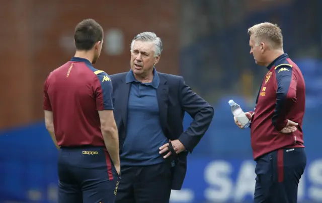 Carlo Ancelotti chats with John Terry