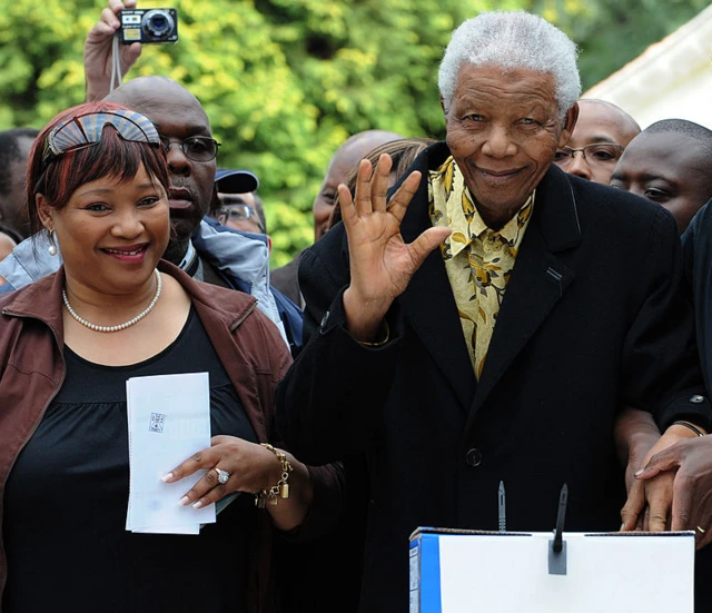 Zindzi Mandela with her father Nelson Mandela in 2009