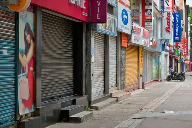 Closed shops and empty streets in Bangalore city