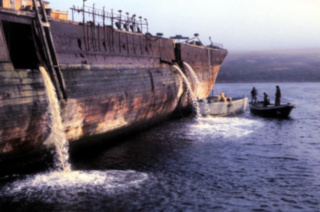The ship is pumped of gallons of mud and water