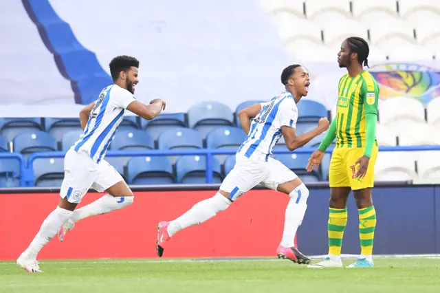 Chris Willock celebrates