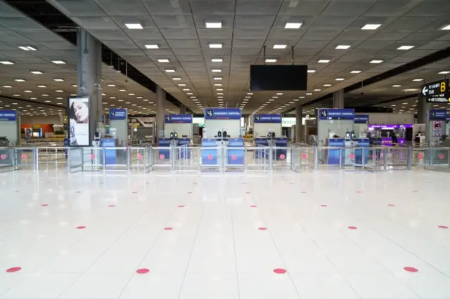 An empty immigration hall at Bangkok's Suvarnabhumi International airport