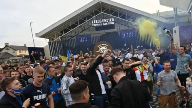 Fans celebrate Leeds's promotion to the Premiership