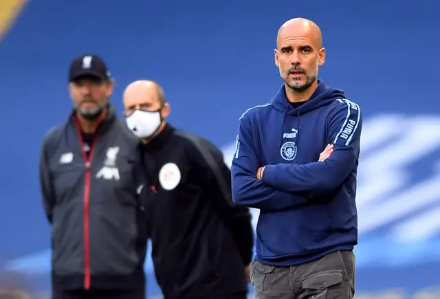 Pep Guardiola, Mike Dean and Jurgen Klopp