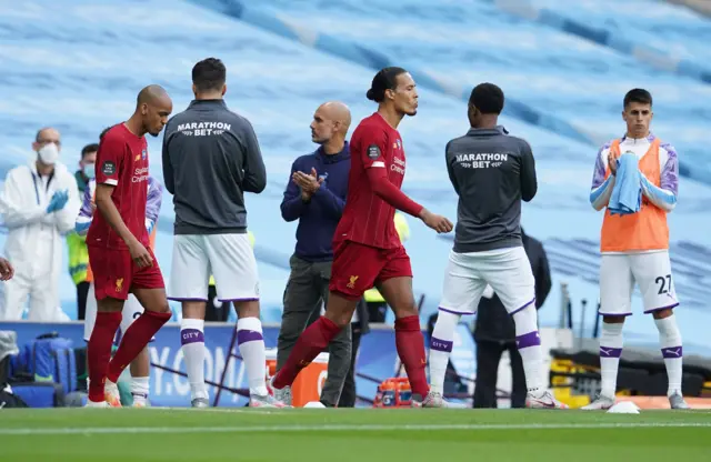 Manchester City players form a guard of honour