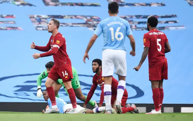 Jordan Henderson reacts as Raheem Sterling wins a penalty