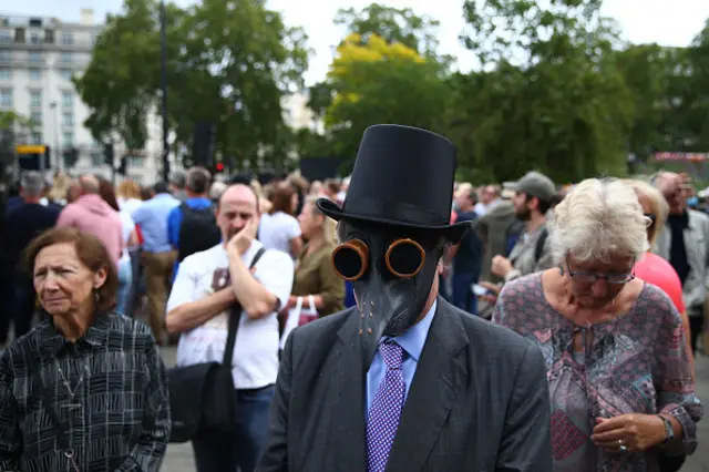 A demonstrator wears a mask at the Keep Britain Free Movement Anti-Mask Protest