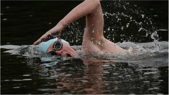 Man swimming in the Serpentine