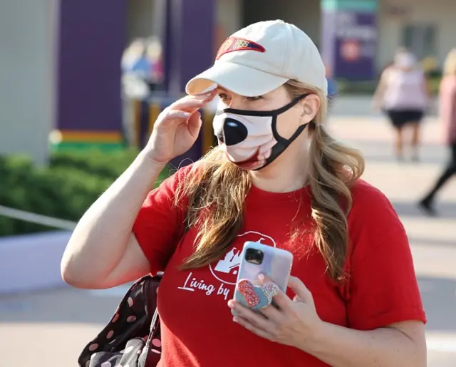 Woman wearing Disney face mask