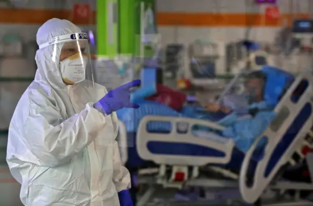 A nurse works in the Covid-19 isolation ward of Sheba Medical Center in Ramat Gan near Tel Aviv, Israel, on 30 June 2020