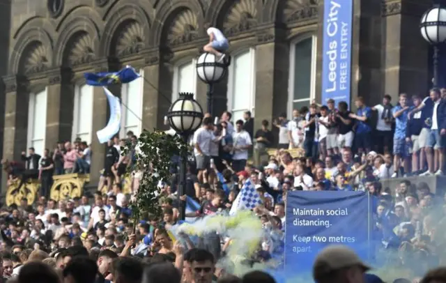 Fans in Millennium Sq