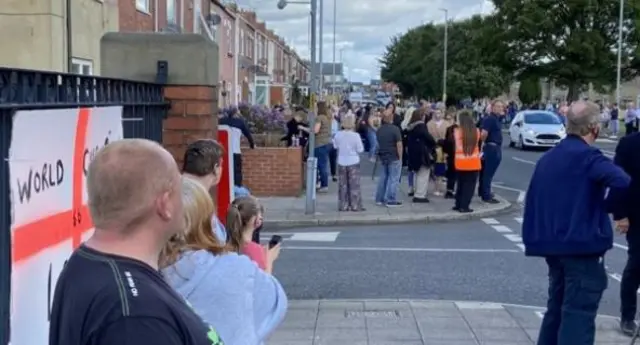 Funeral spectators