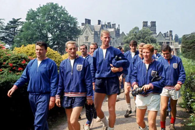 Charlton and teammates in tracsuits