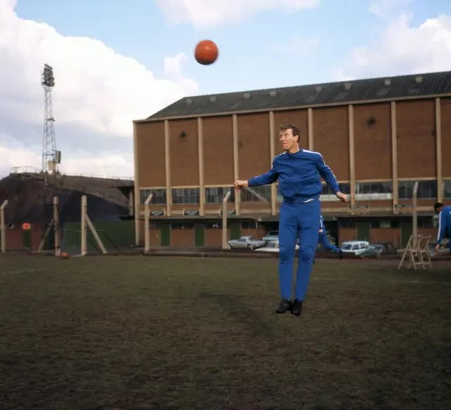 Jack Charlton heads a ball in training